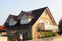 2 Familienhaus Fertighaus in Hasbergen Lotte, Balkon, 4 Gauben, Mauerwerk Verzierungen, Rundbogenfenster, KWL mit WRG