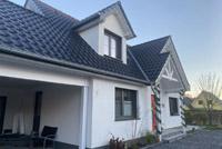 Einfamilienhaus mit Doppel-Carport-Anlage mit Satteldach, amerikanischer - holländischer Landhaus-Stil, Neubau Osnabrück Lotte