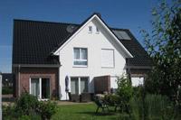 Modernes Doppelhaus in Dülmen, Putz- Klinker- Fassade, Erdwärme (li.), Solaranlage (re.), Satteldach, Giebel, Spitzboden