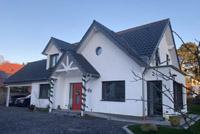 Einfamilienhaus mit Doppel-Carport-Anlage mit Satteldach, amerikanischer - holländischer Landhaus-Stil, Neubau Osnabrück Lotte