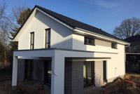 Überdachung Terrasse, Putz- Klinker- Haus mit Satteldach, moderne Bauweise