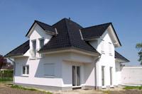 Putzbau Einfamilienhaus mit Walmdach in Ochtrup (Gronau, Bad Bentheim, Metelen), Balkon, Viergiebelhaus, massiv