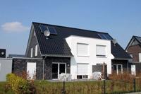 Doppelhaus Massivhaus in Greven, NRW - Flachdachausbau, kontrollierte Wohnraumlüftung (KWL mit WRG), Solaranlage